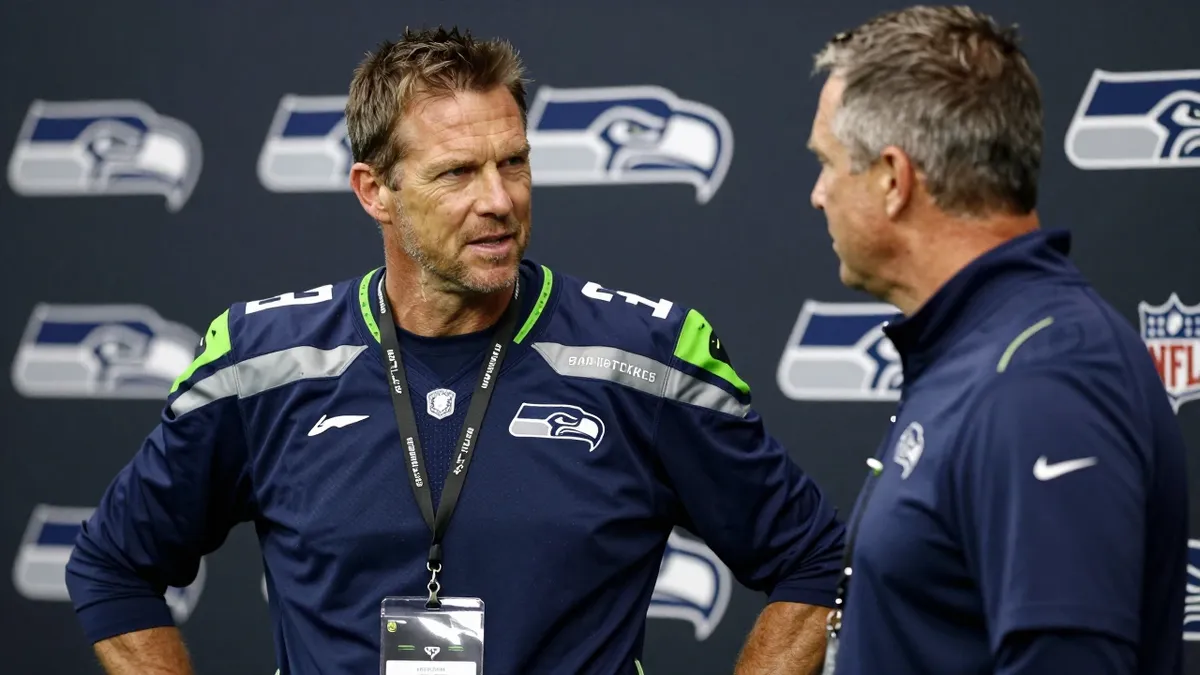 San Antonio Spurs head coach Mitch Johnson, fresh from an NBA Finals run, visits the Seattle Seahawks to exchange...