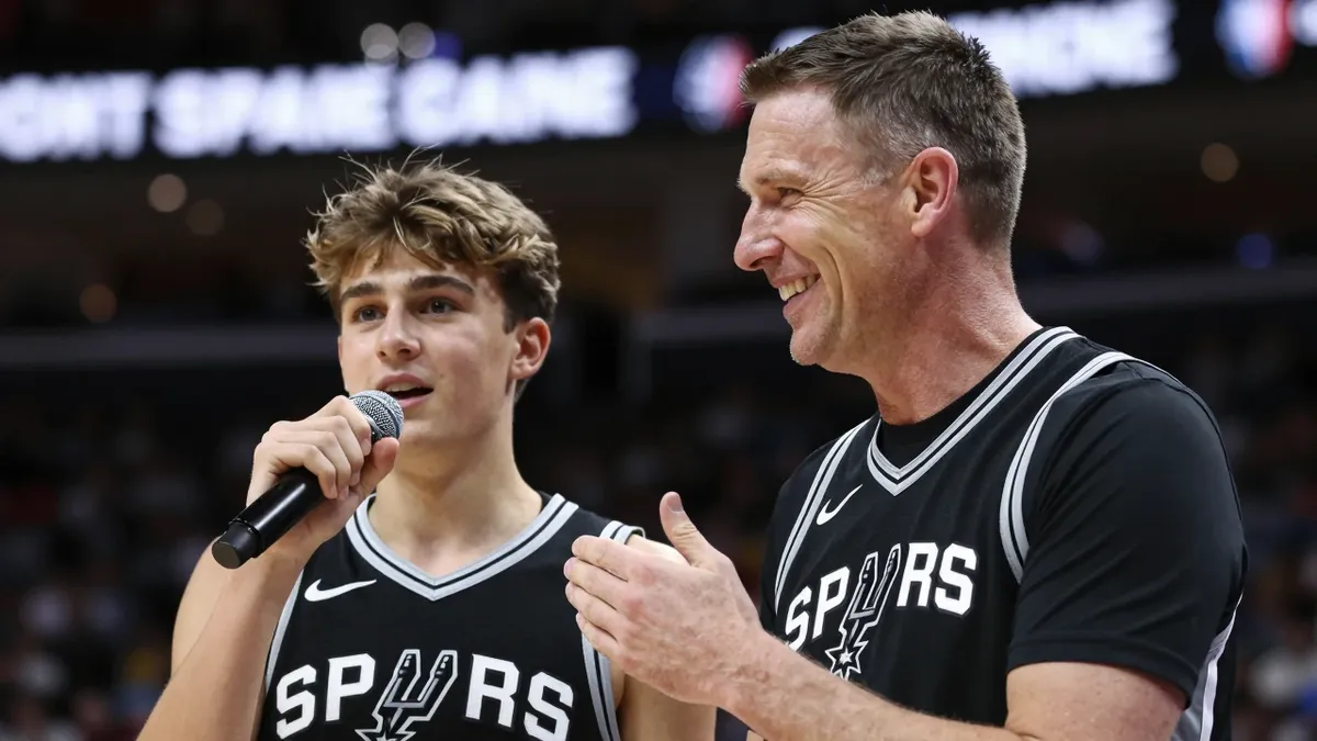 San Antonio Spurs fans celebrate a heartwarming moment involving Maurice Cheeks, a former assistant coach who helped a...
